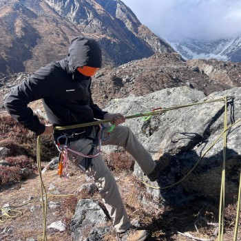 Rappelling on Rock Cliff